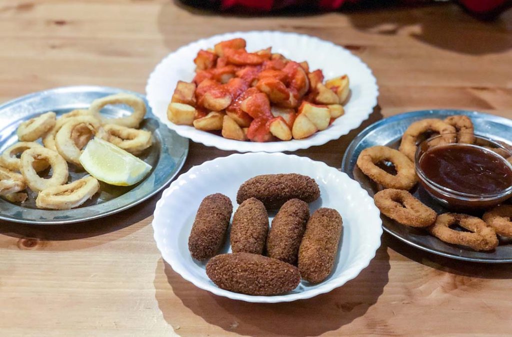 Diverse portate vegane servite da B13 bar bistrot a Madrid